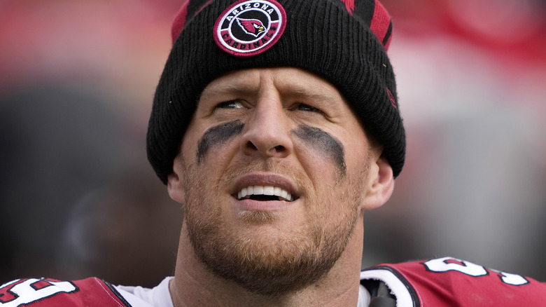 J.J. Watt looking up on the football field