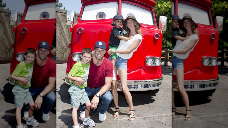 Gisele Bündchen, Tom Brady, and kids posing with van