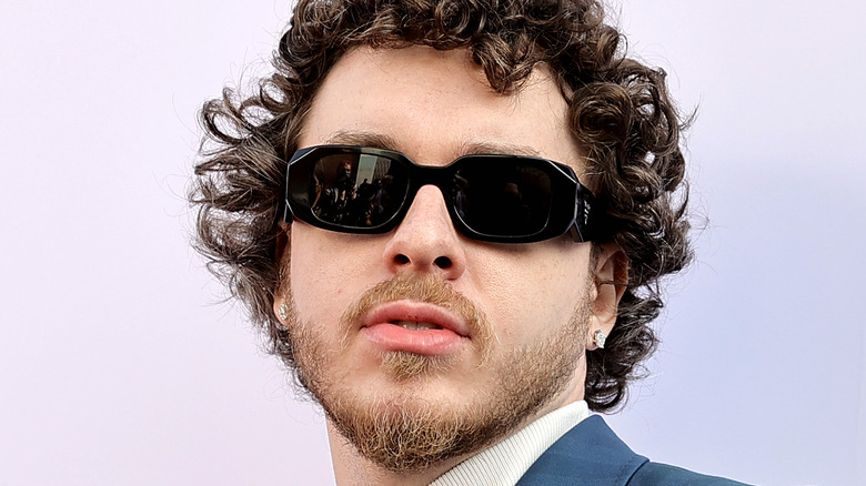 Jack Harlow wearing dark sunglasses