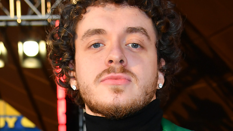 Jack Harlow wearing green leather