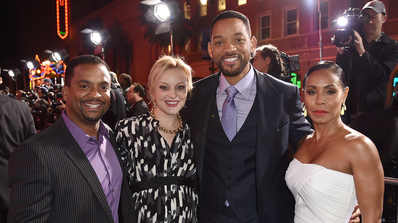 Alfonso Rebeiro, Angela Unkrich, Will Smith, and Jada Pinkett Smith posing