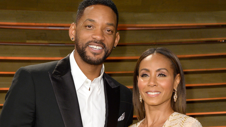 Will Smith and Jada Pinkett Smith posing and smiling