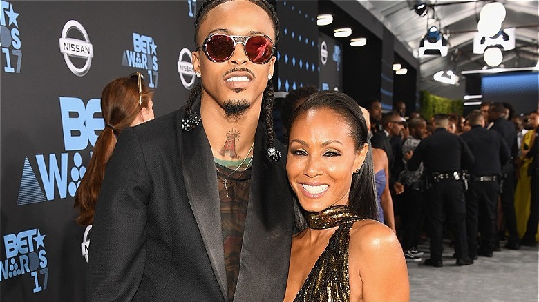 August Alsina and Jada Pinikett-Smith smiling