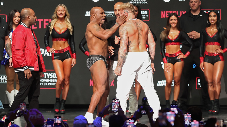 Mike Tyson slapping Jake Paul in their ceremonial weigh-in