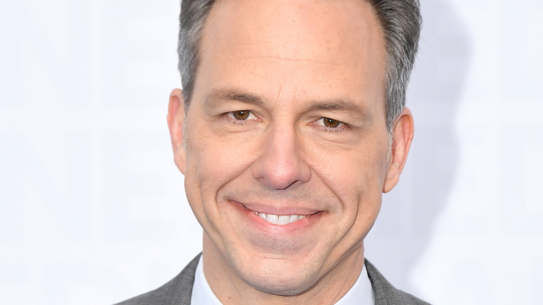 Jake Tapper smiles