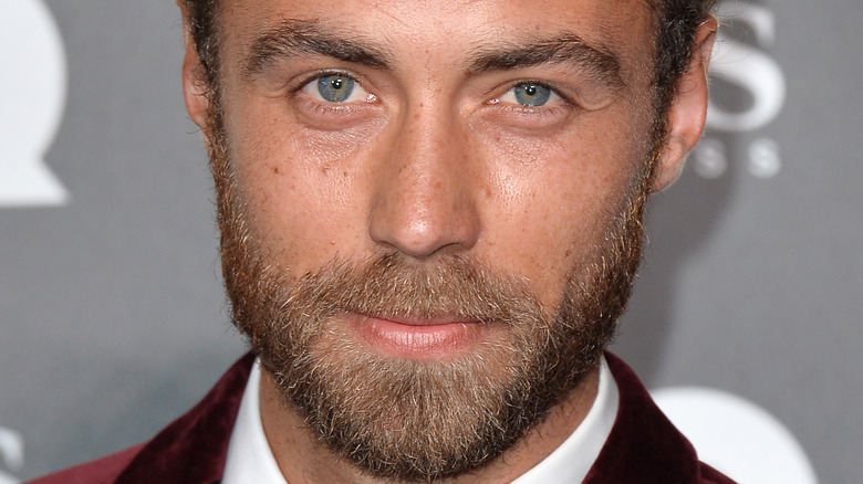 James Middleton looking at the camera