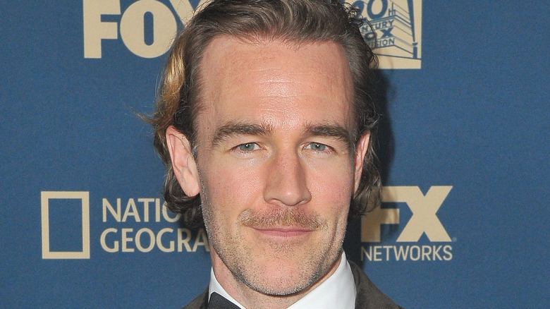 James Van Der Beek posing for cameras