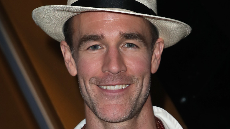 James Van Der Beek posing for cameras