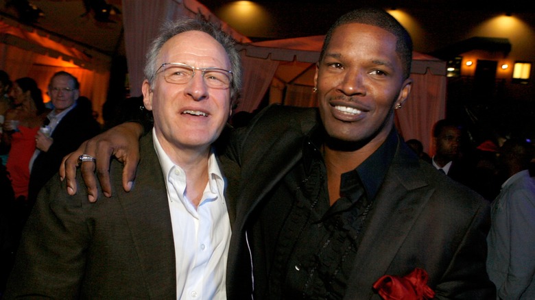 Jamie Foxx with arm around Michael Mann