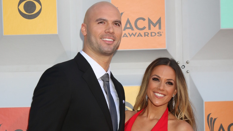 Mike Caussin and Jana Kramer posing