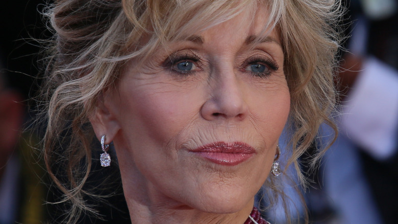 Jane Fonda diamond earrings smiling