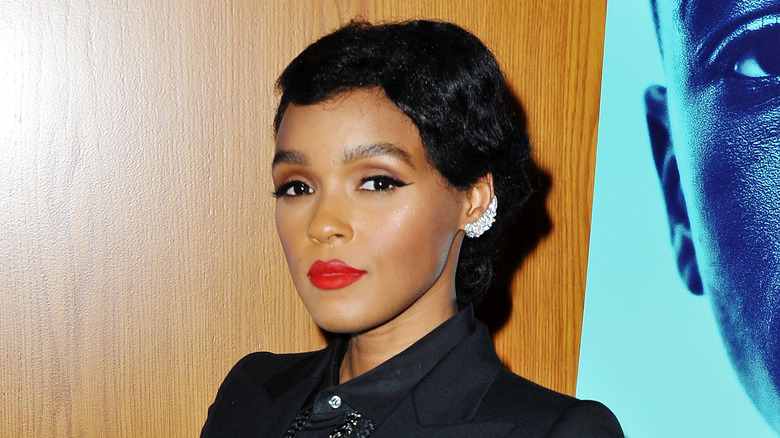 Janelle Monae posing