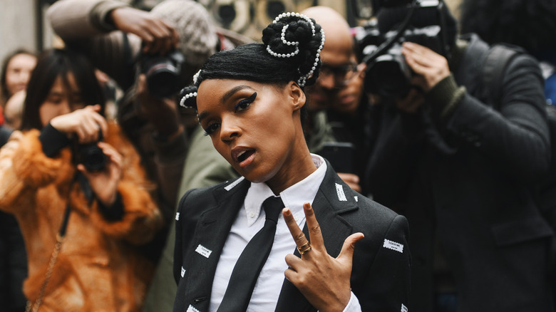 Janelle Monae posing