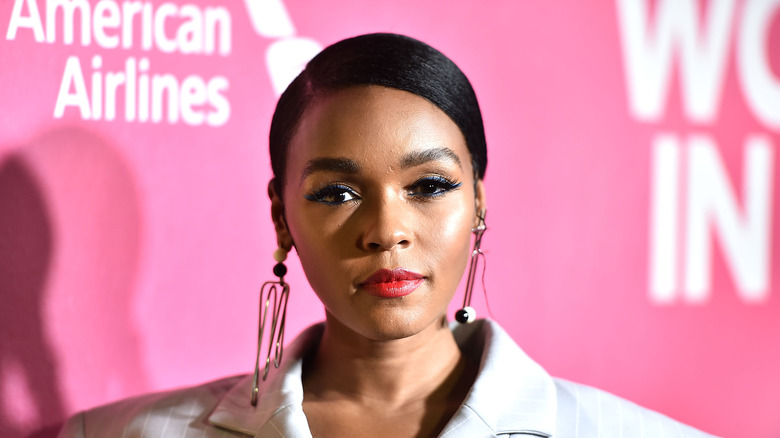 Janelle Monae posing