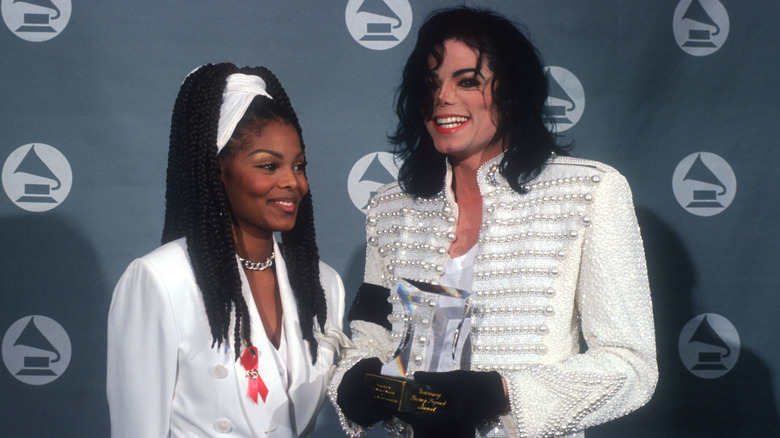 Janet Jackson and Michael Jackson smiling on the Grammys red carpet