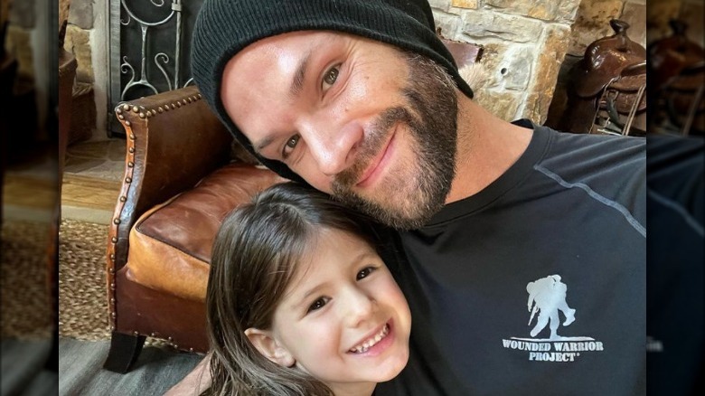 Jared Padalecki smiles with his daughter