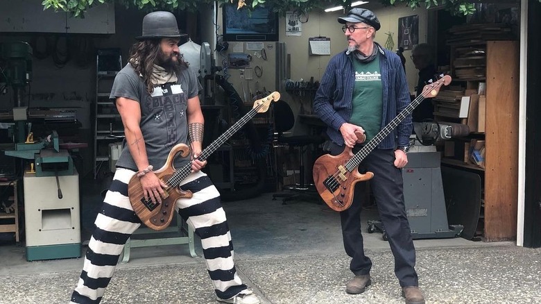 Jason Momoa and Les Claypool of Primus posing