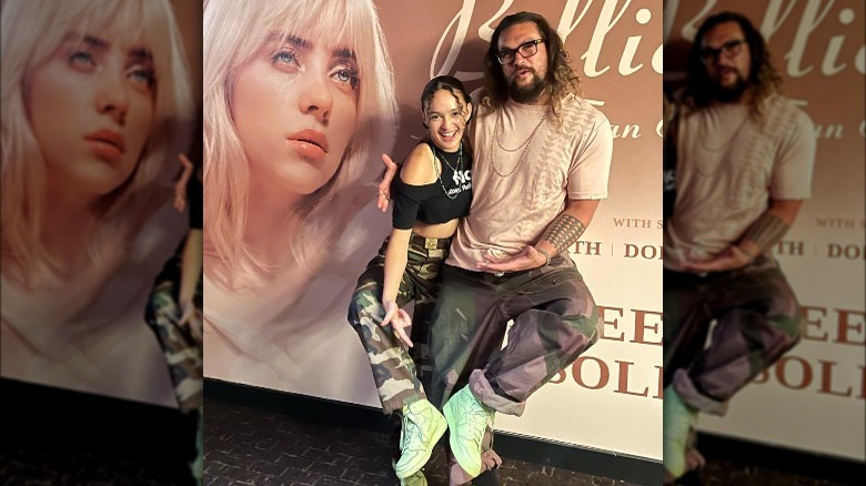 Lola and Jason Momoa posing