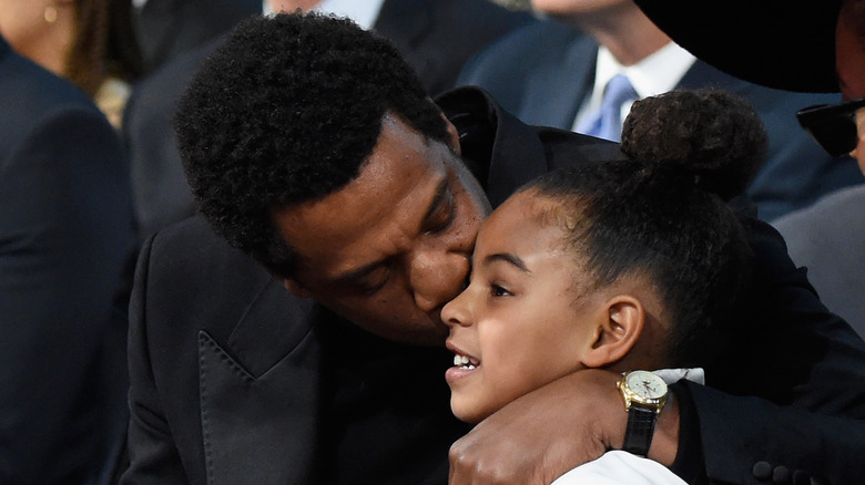 Jay-Z kissing his daughter Blue Ivy at the Grammys 