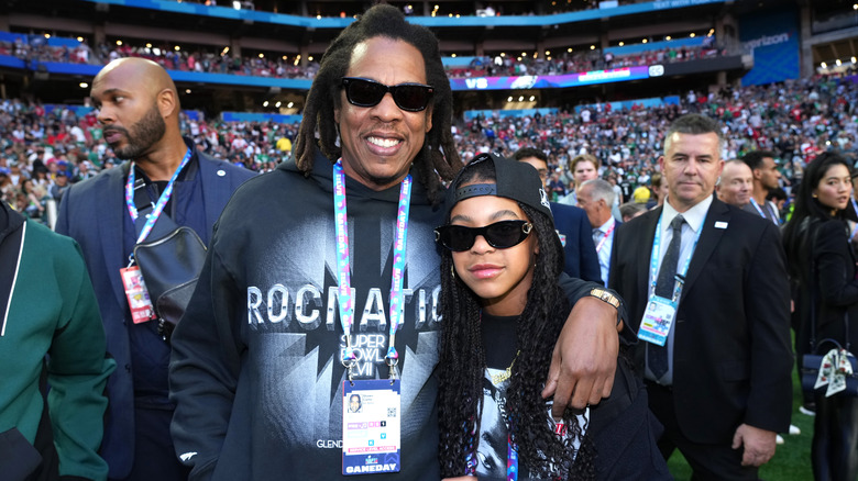 Jay-Z and Blue Ivy posing