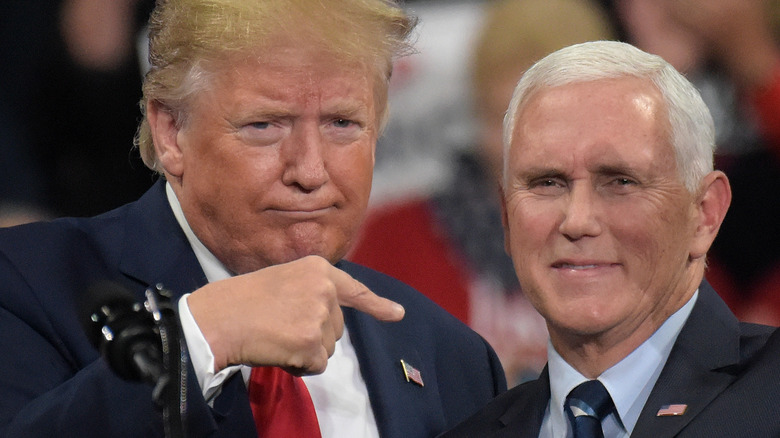 Donald Trump pointing at Mike Pence during a rally