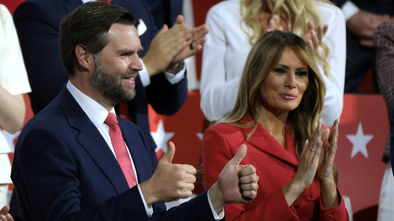 JD Vance clapping alongside Melania Trump