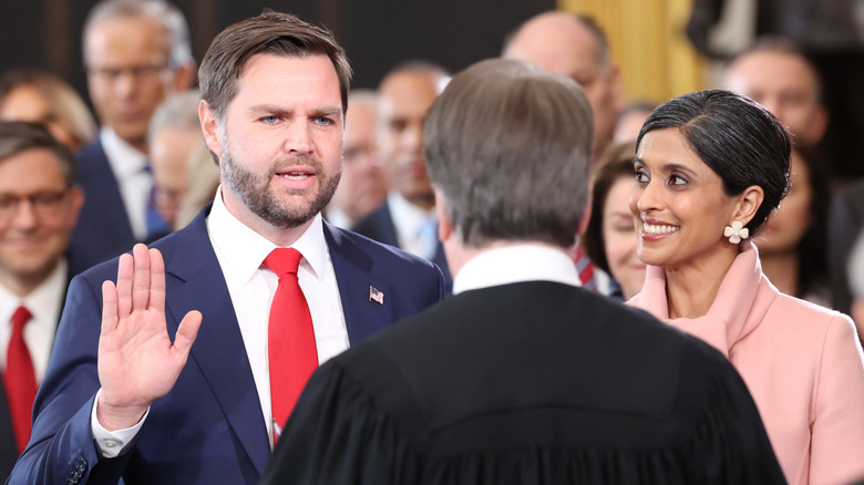 JD Vance being sworn in with Usha Vance