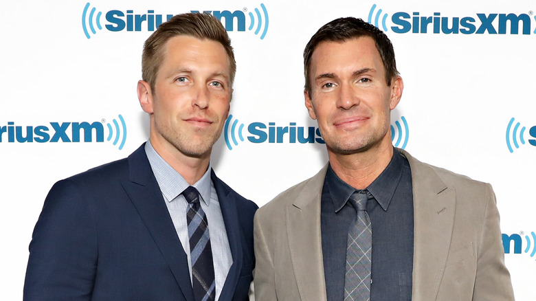 Jeff Lewis and Gage Edward posing at an event 