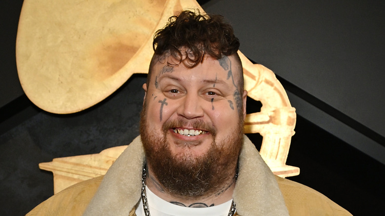 Jelly Roll smiling in close-up at 2024 Grammys