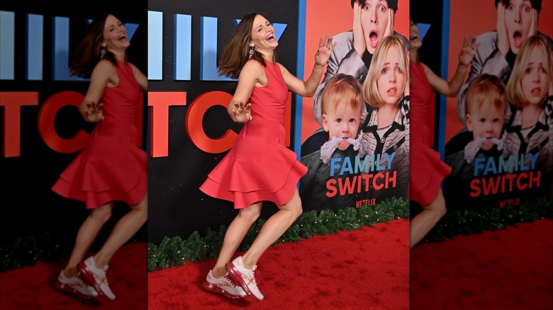 Jennifer Garner in a red dress and sneakers