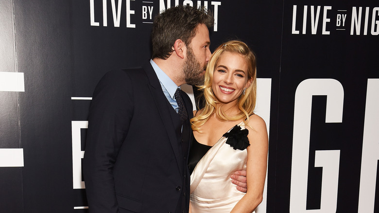 Ben Affleck kissing Sienna Miller's hair