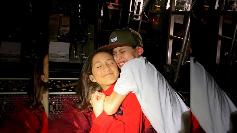 Emme and Max backstage