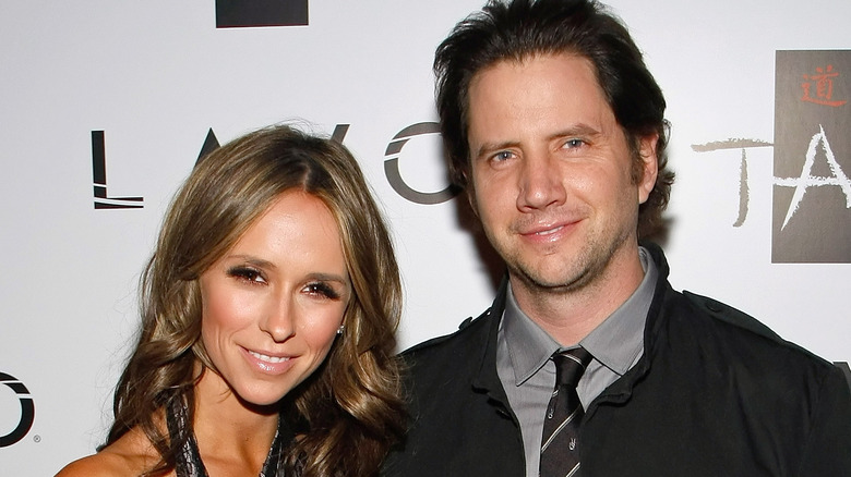 Jamie Kennedy and Jennifer Love Hewitt posing at an event