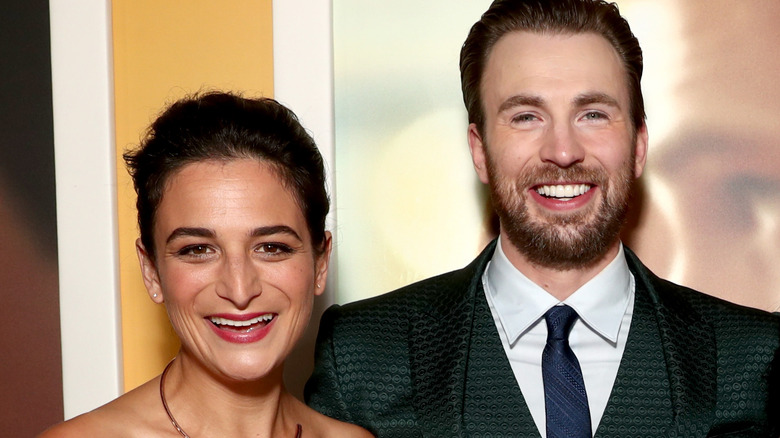 Jenny Slate and Chris Evans smiling