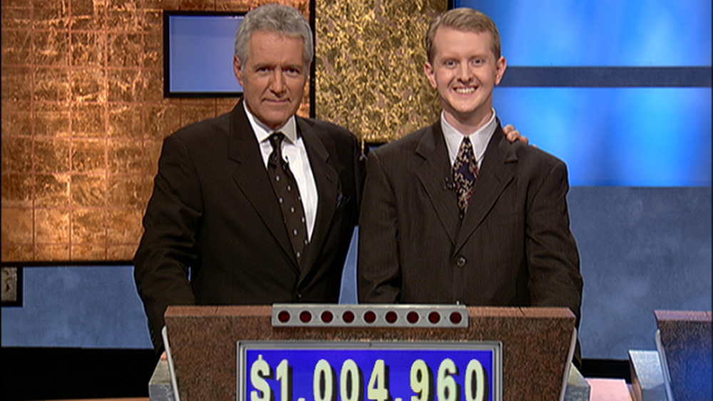 Alex Trebek and Ken Jennings smile at Jeopardy!