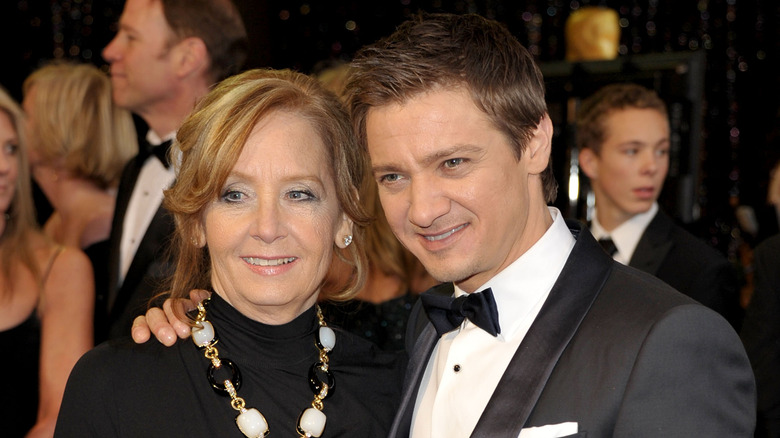 Jeremy Renner and his mother posing for a picture