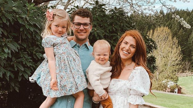 Jeremy and Audrey Roloff posing with their children