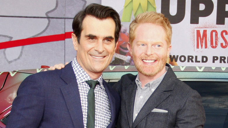 Jesse Tyler Ferguson posing with Ty Burrell