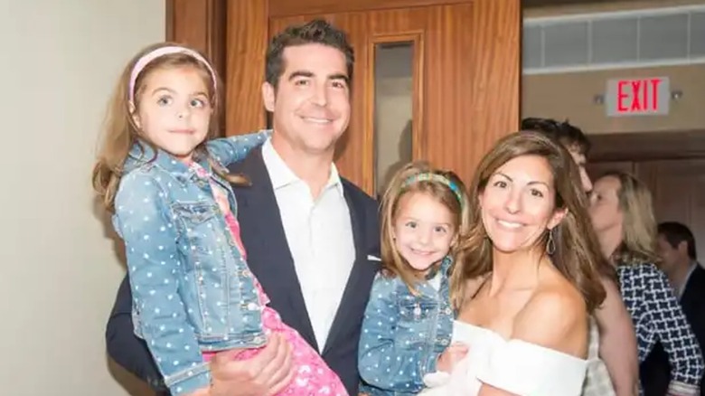 Noelle Inguagiato and Jesse Watters pose with their twin daughters