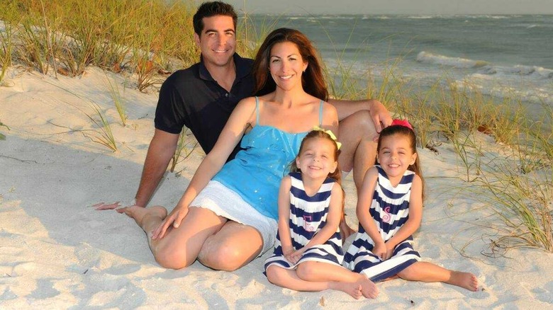 Noelle Inguagiato and Jesse Watters pose with their twin daughters