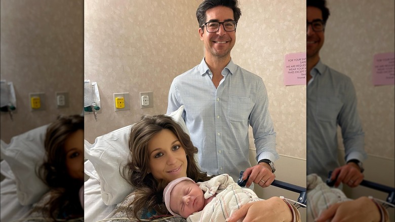 Emma and Jesse pose with their daughter Georgina