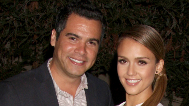 Cash Warren and Jessica Alba smile in a photo