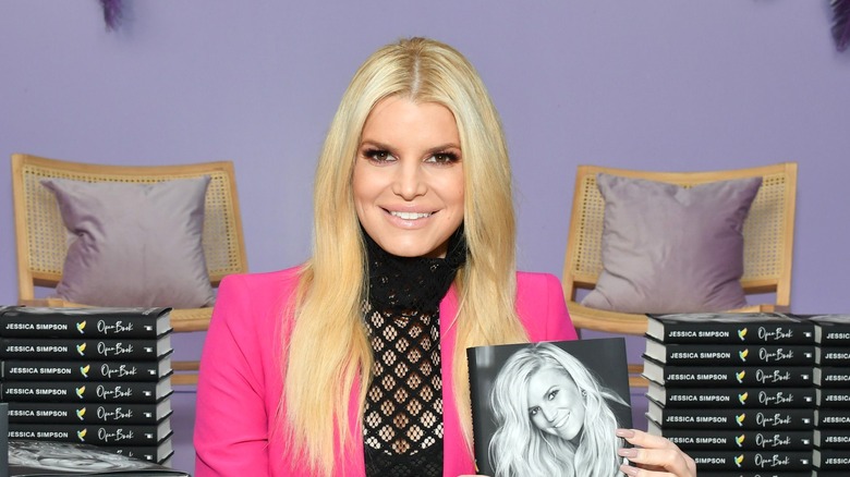 Jessica Simpson holding book