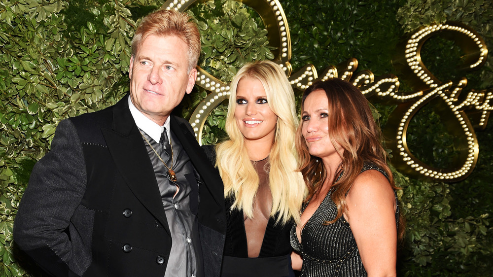 Joe Simpson, Jessica Simpson, and Tina Ann Drew pose for a photo 