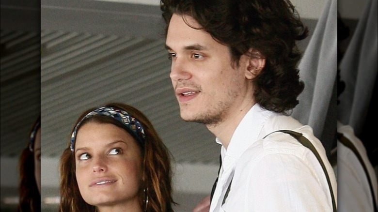 Jessica Simpson looking up at John Mayer