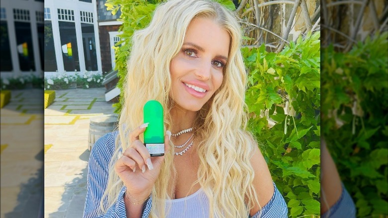 Jessica Simpson holding Flonase bottle