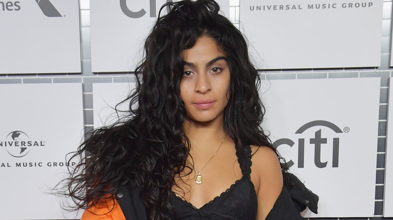 Jessie Reyez poses on the red carpet