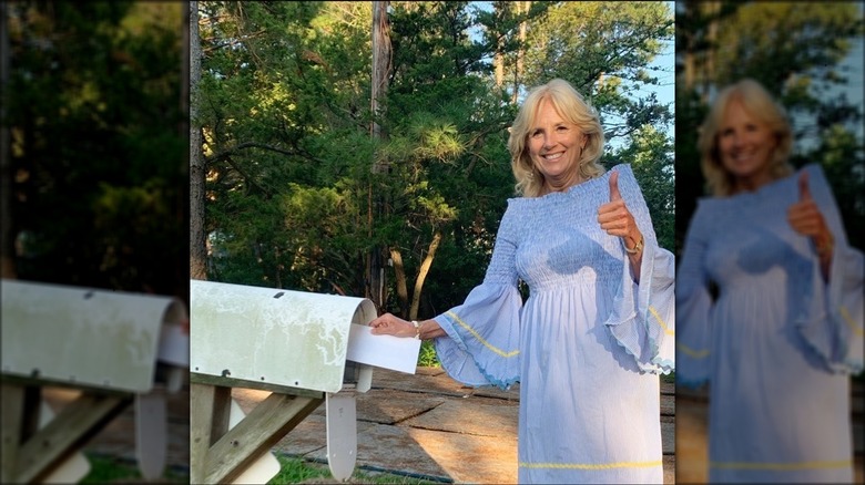 Jill Biden placing letter in mailbox