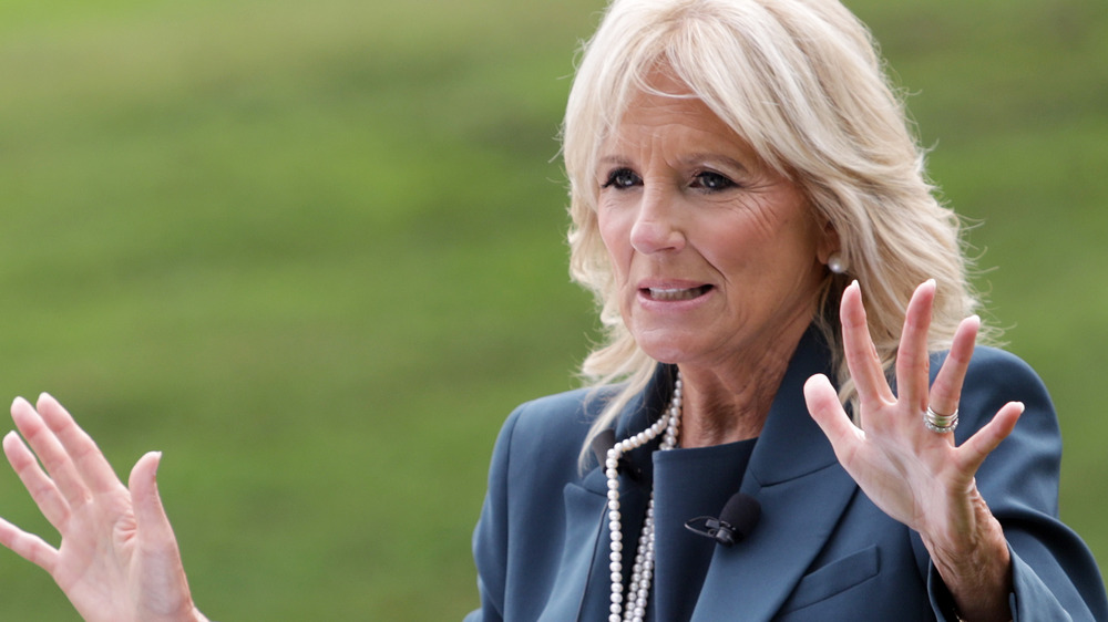 Jill Biden hands raised