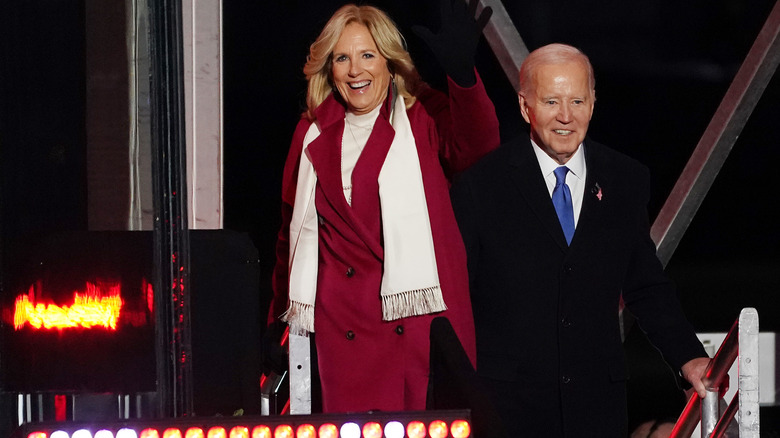 Jill Biden and Joe Biden smiling in winter wear